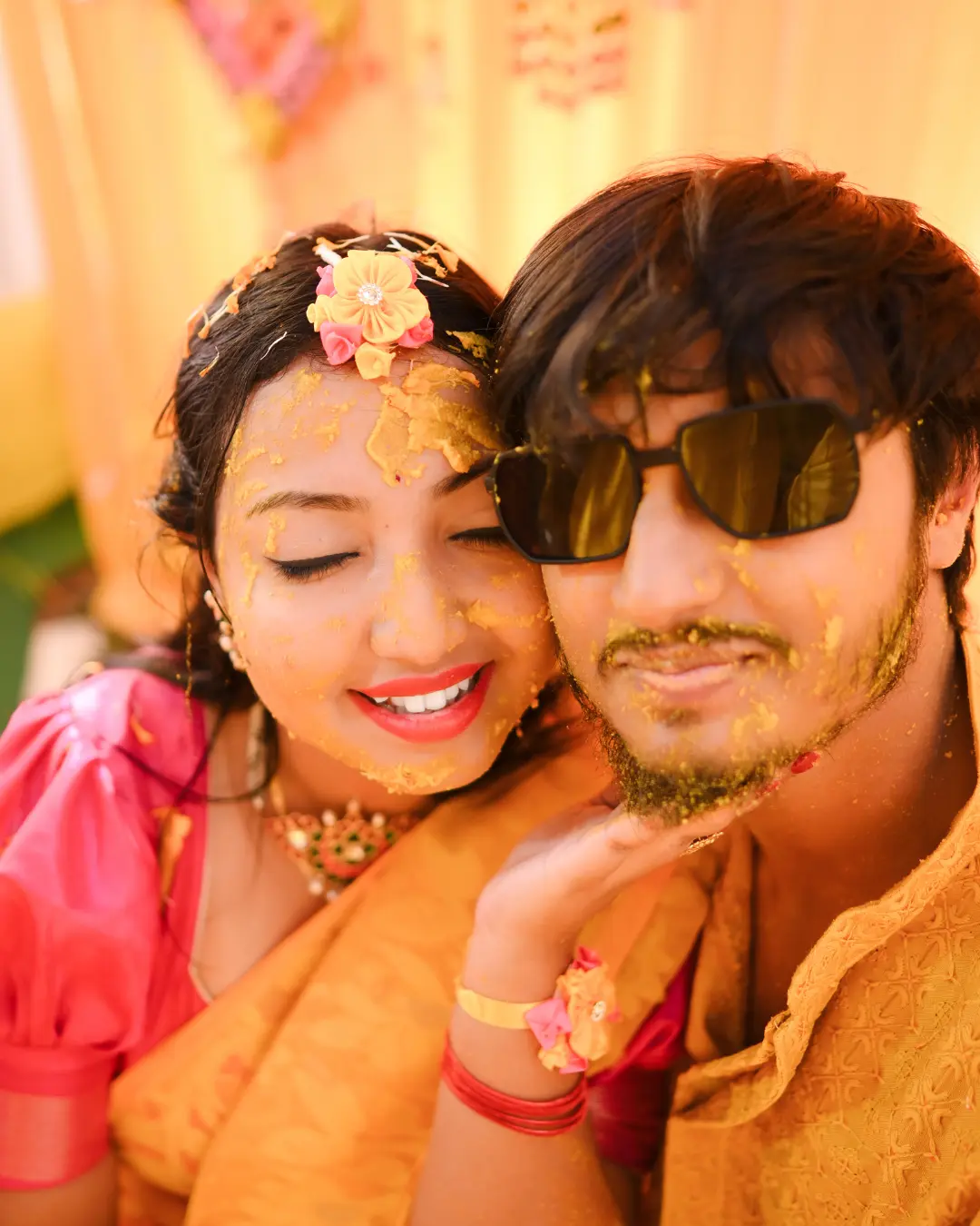 Bengali couple celebrating haldi